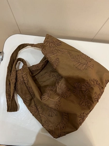Retro brown faux suede shoulder bag with intricate floral embroidery and wide strap