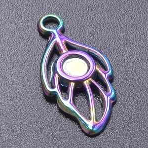 Detailed view of rainbow-colored leaf pendant with teardrop hollow and round base