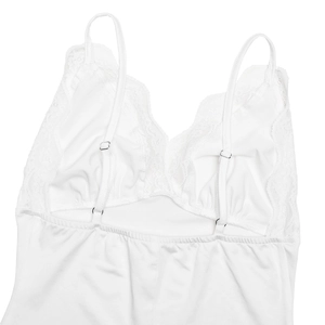 Detailed back view of white lace bodysuit showing adjustable straps and elastic waist band