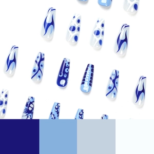 Blue mixed pattern coffin press-on nails with abstract flame and geometric line designs