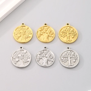 Detailed set of circular stainless steel Tree of Life pendants in gold and silver finishes