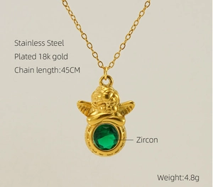 Detail of 18K gold plated stainless steel angel pendant with a green zircon stone