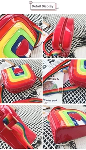 Detailed views of the rainbow heart crossbody bag featuring glossy leather and striped strap