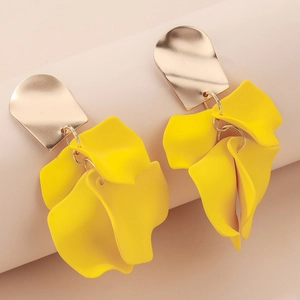 Detail showing golden metal plates and yellow frosted 3D flower petals of the earrings
