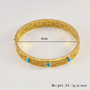 Detail view of gold bohemian bangle showing 6cm inner diameter and turquoise stones