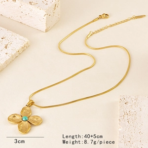 Detailed view of a gold clover necklace with turquoise stone and dimension specs