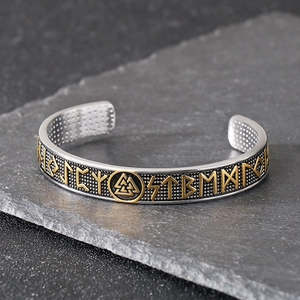 Nordic Viking runes bangle in antique silver and gold finish on dark stone