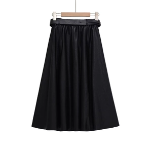 Fashionable high waist black leather midi skirt with matching belt on white background