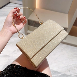 Bolso de noche dorado champán brillante con pedrería y asa metálica para mujer