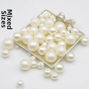 Mixed sizes of white ABS faux pearls with matte textured surface for DIY jewelry making