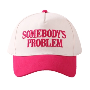 Two-tone pink baseball cap with SOMEBODY'S PROBLEM embroidery and adjustable strap