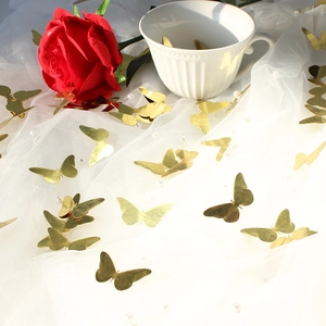 3D golden butterfly sequins scattered on white tulle with pearls for party decor