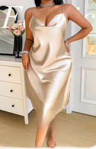 Detail of champagne satin slip dress featuring elegant cowl neck and silky glossy fabric