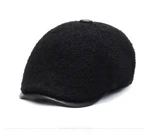 Detail view of winter black ivy cap with thick fleece fabric and sleek leather visor