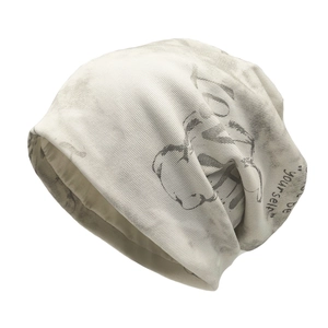 Light gray knit beanie with hand-drawn pattern and 'be yourself' slogan on white background