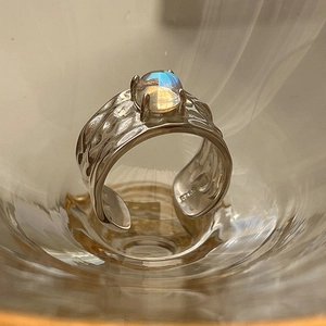 S925 silver irregular hammered open ring featuring a blue moonstone in four-prong setting