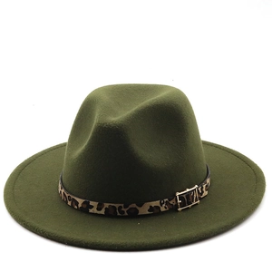 Detail of olive green fedora hat featuring a leopard print band and golden buckle