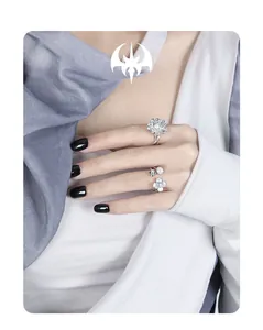 Close-up of S925 silver flower rings set with micro-set zircon and pearl detail