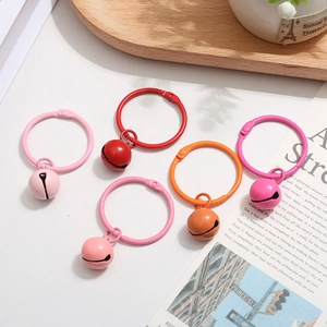 Colorful metal keyrings with matching bells in pink, red and orange colors
