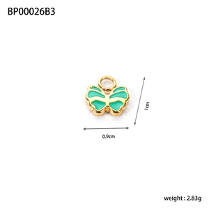 Detail of green enamel butterfly pendant with gold frame and size measurements