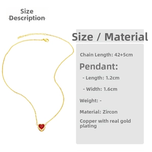 Detail showing red zircon heart pendant with gold plated copper chain and O-link closure