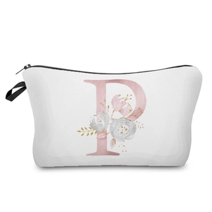 Detailed view of the pink floral letter P print on a white cosmetic makeup bag