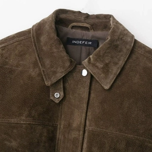 Deep brown suede bomber jacket with classic lapel collar and premium stitching details