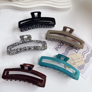 Five assorted minimalist acetate hollow square hair claws in tortoiseshell and neutral colors