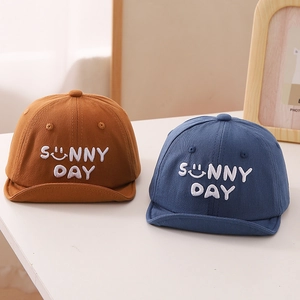 Baby soft brim baseball cap featuring Sunny Day embroidery in orange and blue