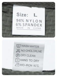 Detail view of the clothing label showing size L and 94 percent nylon fabric composition