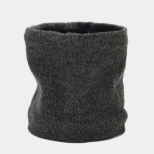 Detailed knit texture of a dark grey winter neck warmer in a soft thermal yarn style