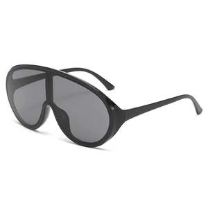 Chic oversized black shield sunglasses with Y2K tech style and high-gloss wrap frame