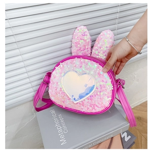 Pink sequin crossbody bag for kids featuring cute rabbit ears and shiny heart detail