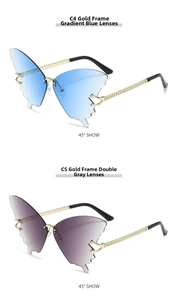 Detail of rimless butterfly sunglasses with gold woven temples and gradient lenses
