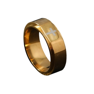 Minimalist wide golden stainless steel ring featuring a polished silver cross emblem