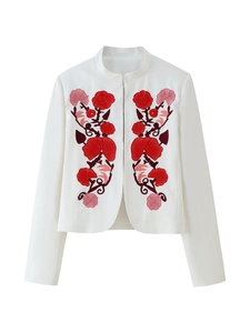 Detail of red floral embroidery on white standing collar jacket with high quality texture