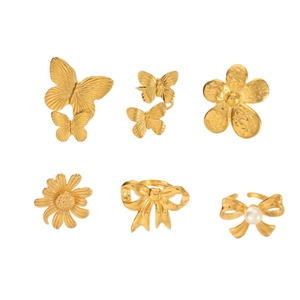 Set of 6 vintage style 18k gold-plated rings with butterfly, flower, and pearl details