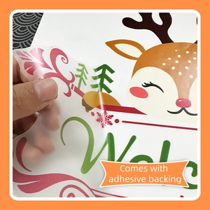 Detail showing self-adhesive backing of the Christmas reindeer wall sticker for easy application