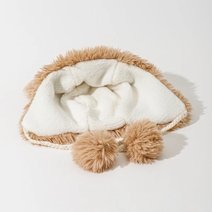 Winter plush trapper hat with bear ears, camel faux fur lining and pompom drawstrings