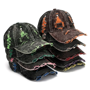 Distressed denim baseball cap with frayed edges and colorful contrast stitching