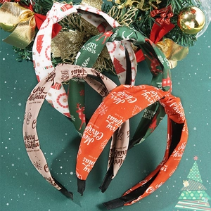 Set mit vier festlichen Weihnachts-Haarreifen mit roten, grünen und weißen Weihnachtsmustern