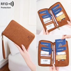 Portafoglio da viaggio marrone con protezione RFID e scomparti per passaporto