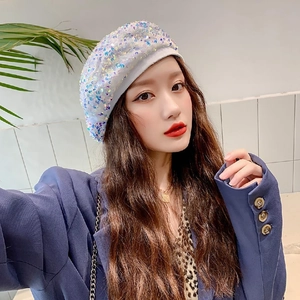 Chic white beret hat with colorful reflective sequins for a stylish sparkle