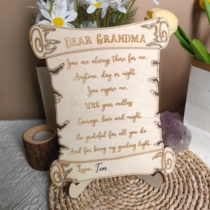 Detailed laser-engraved wooden Mother's Day gift for grandmother on a decorative mat