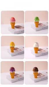 Close-up of six assorted PU faux ice cream cones with colorful jam toppings and sprinkles