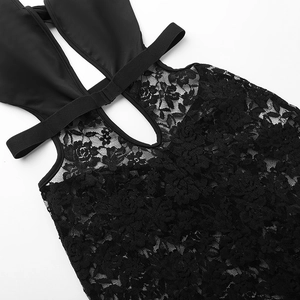 Close-up of black lace jumpsuit featuring floral rose patterns and elastic halter straps