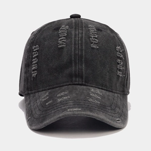 Washed denim baseball cap with distressed rip details in vintage charcoal grey style
