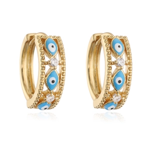 Bohemian gold evil eye hoop earrings with blue enamel and sparkling zircon accents