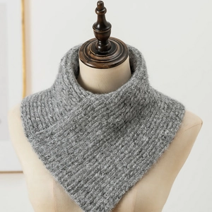Winter chunky grey knit neck warmer for women made of soft wool worn by a mannequin