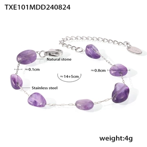 Macro detail of natural purple stone bracelet with stainless steel chain and logo tag
